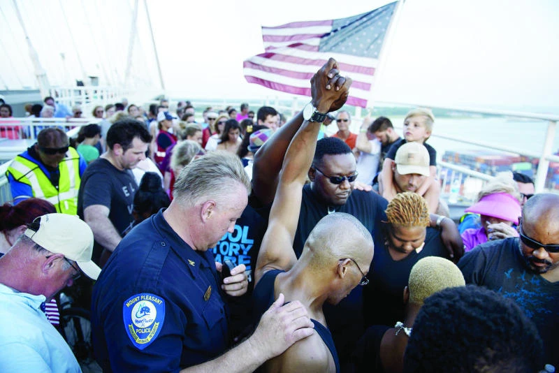Thousands lock arms for Charleston ‘unity chain’
