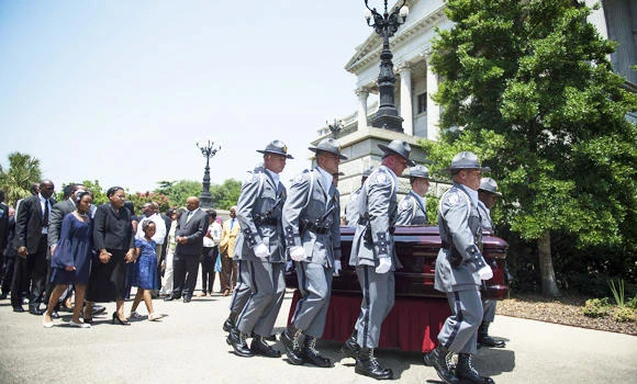 American lawmakers move from Confederate flag debate to grieving