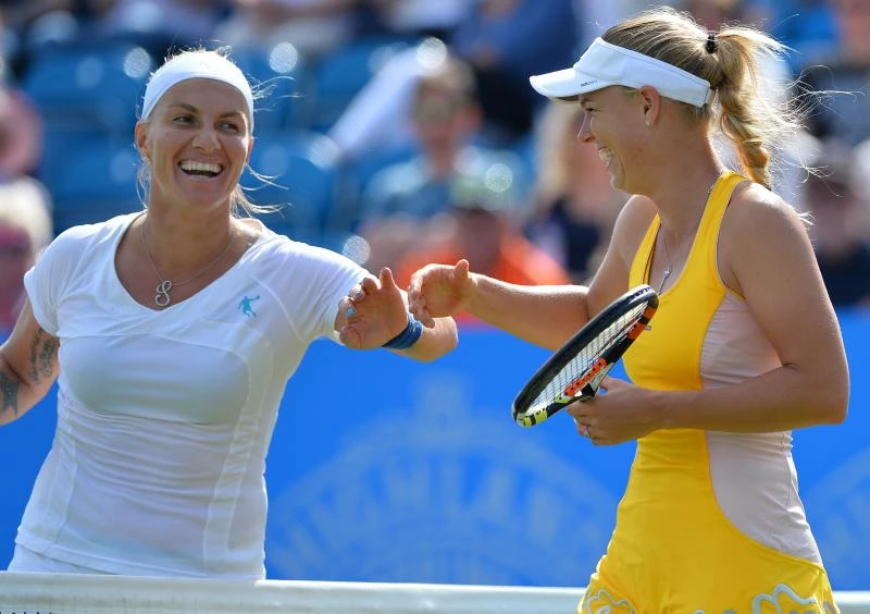 Wozniacki into last-eight; Bouchard injured