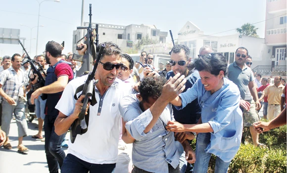 39 die as sunbathing Europeans attacked at Tunisia beach resort