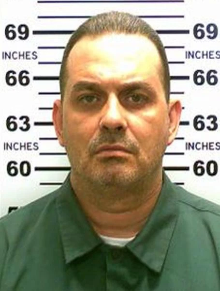 Escaped prisoner killed by police; other is on the run