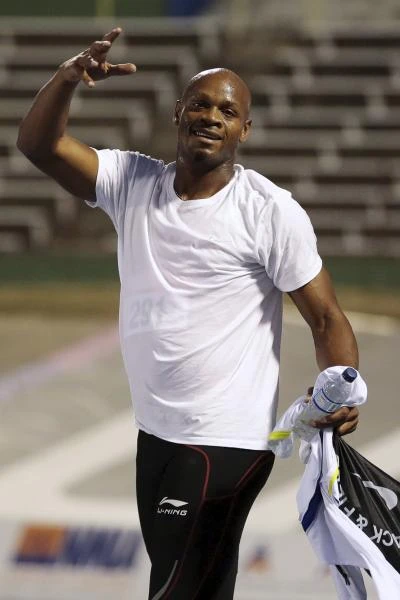 Asafa Powell claims final of men’s 100m in 9.84