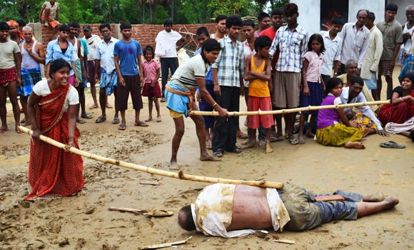 Indian police investigate mob killing of school director