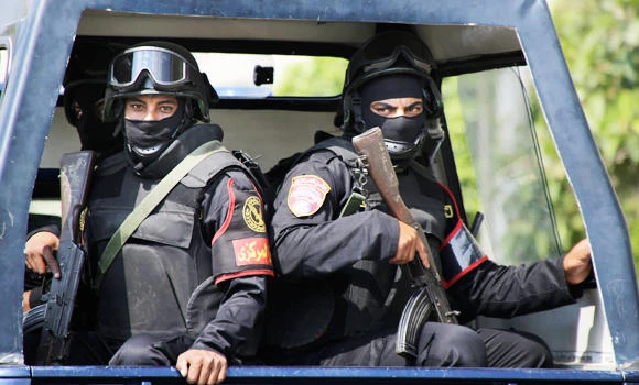 Cairo police raid kills 9
