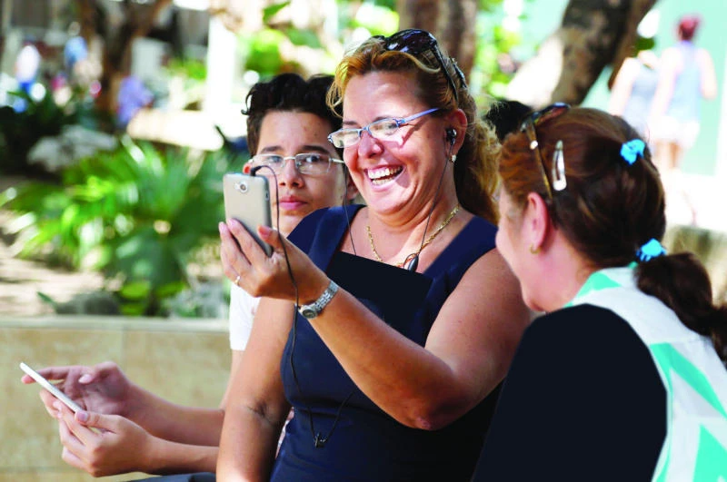 Cuba’s new Wi-Fi hot spots attract eager users
