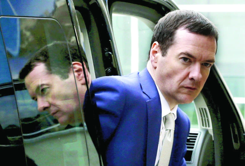 Britain to cut bank deposit protection by 10,000 pounds