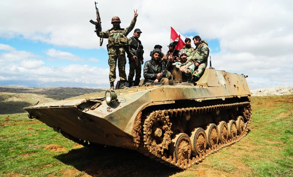 Hezbollah, Assad troops enter rebel-held border city
