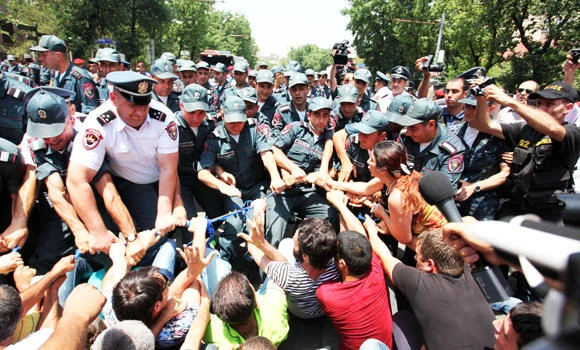 Armenian police disperse protest after two weeks