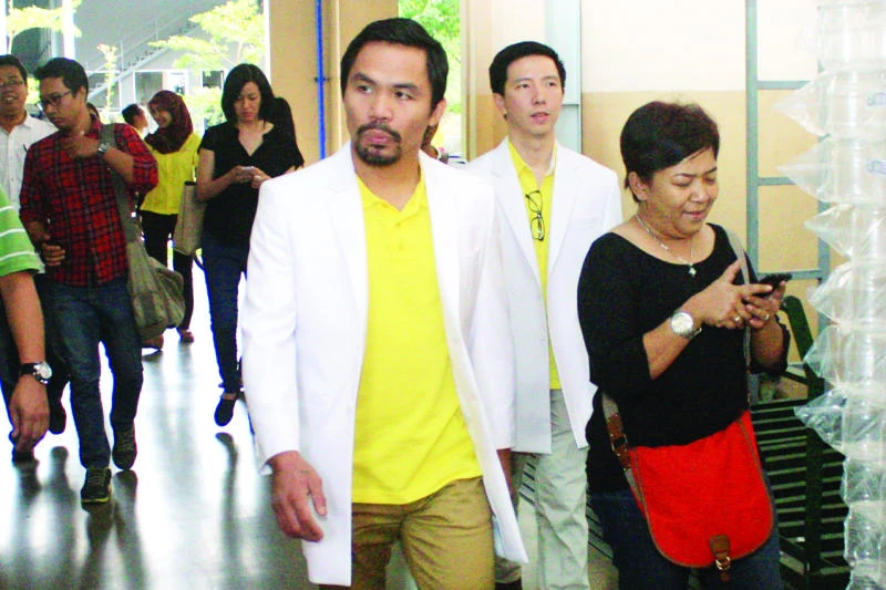Pacquiao to visit death row Filipina on Friday