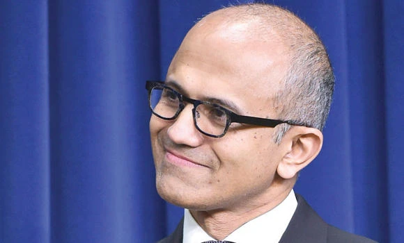 Microsoft cuts 7,800 jobs, reorganizes phone unit