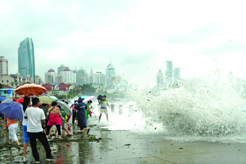 Feared typhoon glances off China eastern coast, limiting damage