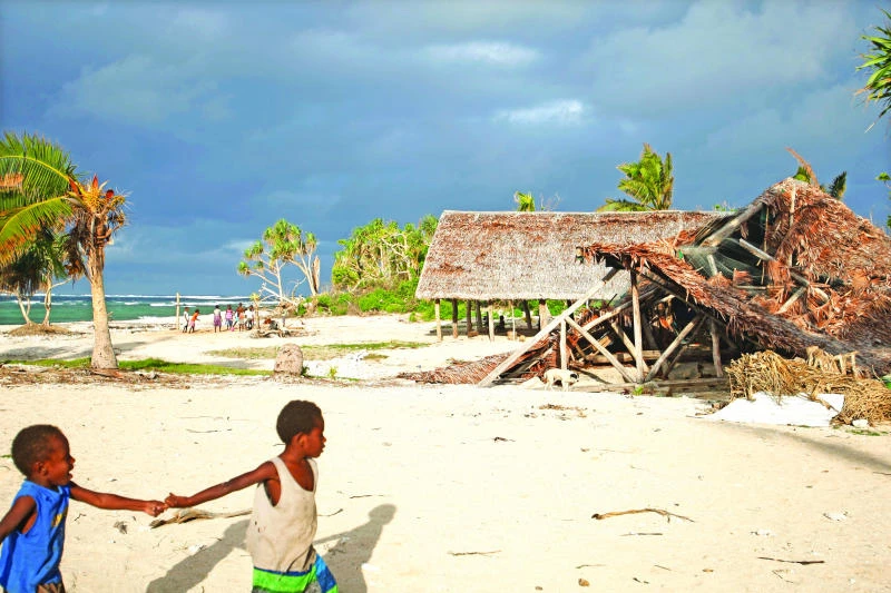 Wary of climate change, Vanuatu villagers seek higher ground