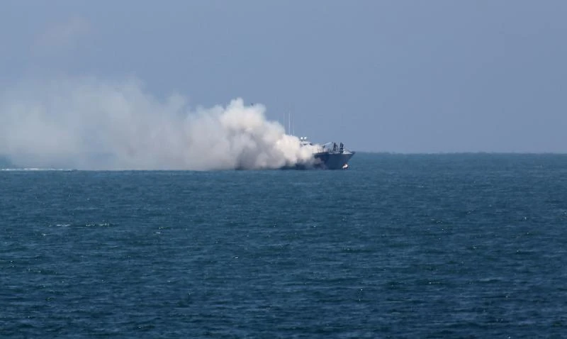 Militants clash with Egyptian coast guard, setting boat on fire