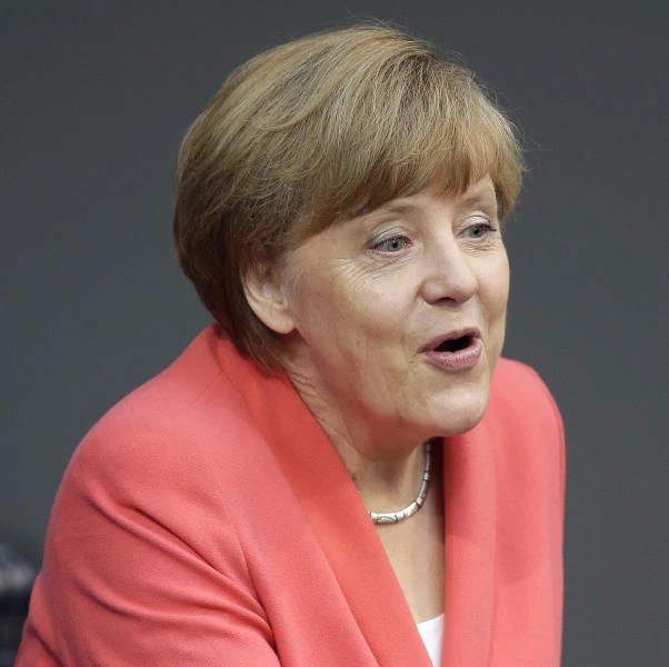 Crying refugee girl puts German chancellor on the spot