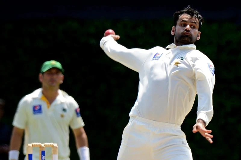 Pakistan offspinner Hafeez banned from bowling for 12 months