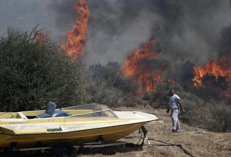 Firefighters battle blazes near Athens