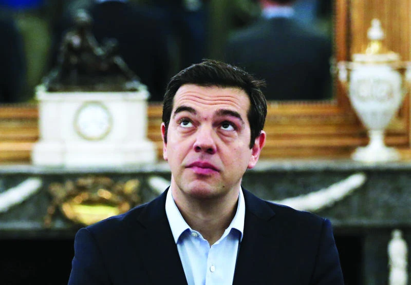 Greek banks to reopen Monday but capital controls remain