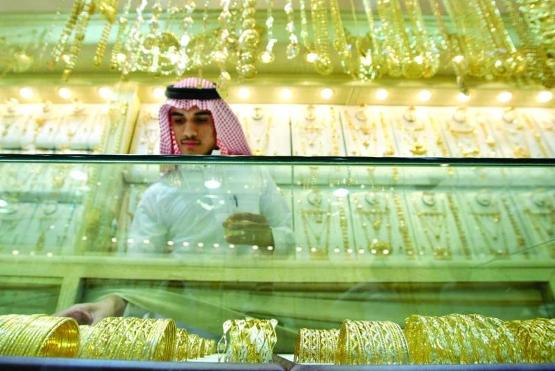 Gold sinks to five-year low