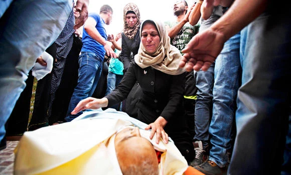 Palestinian murdered in cold blood trying to protect two sons