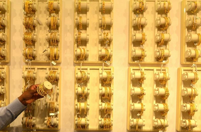 Gold remains under pressure