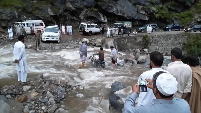 Deadly flash floods in Pakistan damage roads and crops