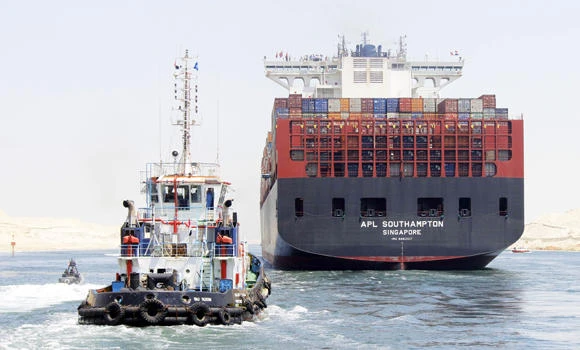 Ships cross Egypt’s New Suez Canal in first test-run
