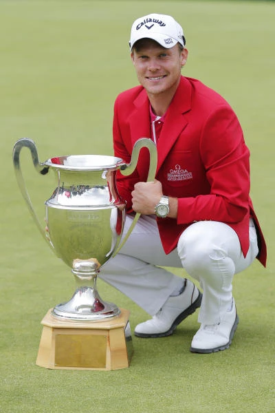 Late birdie rush gives Willett European Masters crown