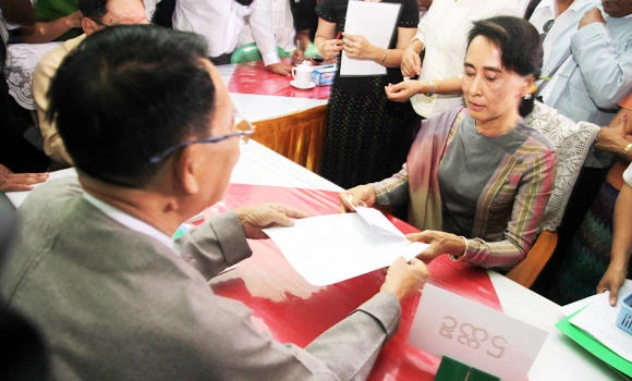 Suu Kyi registers for Myanmar polls as ruling party braces for losses