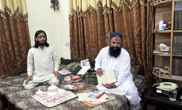 Pakistan police kill feared militant leader, 13 others