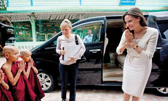 Jolie, Suu Kyi meet female workers in Myanmar