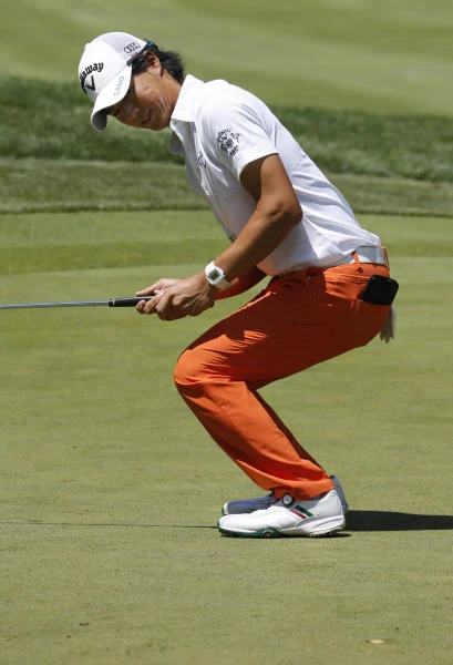Ishikawa edges ahead as Tiger roars