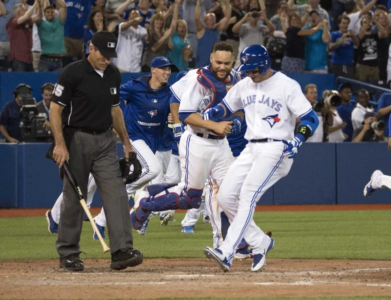 Tulowitzki scores winner as Blue Jays edge Royals in 11 innings