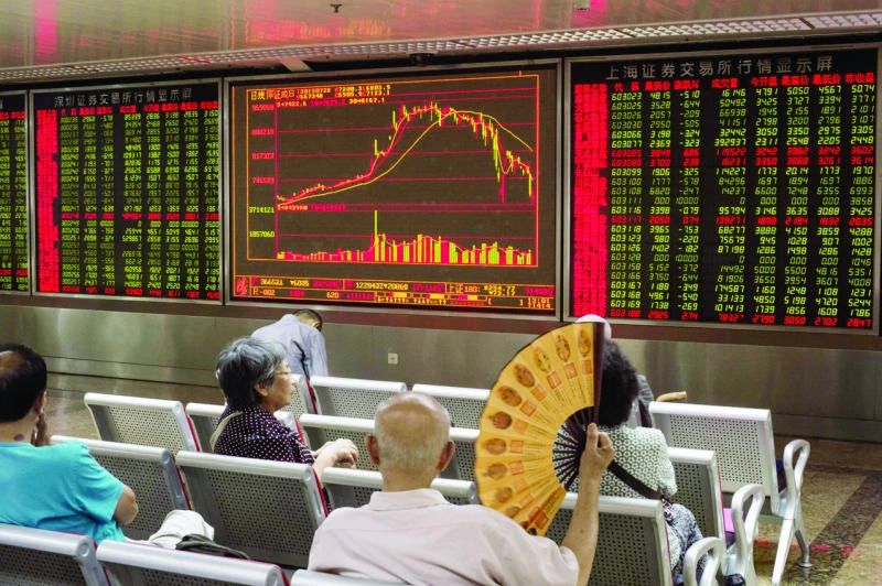 Downward pressure on China economy to persist in 2015