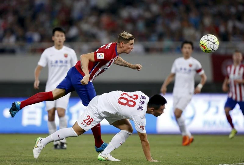 Torres scores with first touch in Atletico triumph