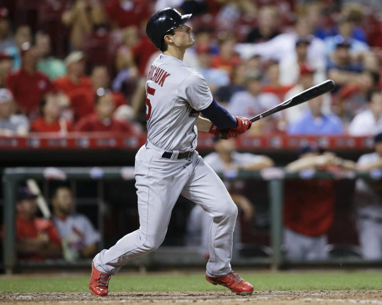 Cardinals rally past Reds 4-3 in marathon 13 innings