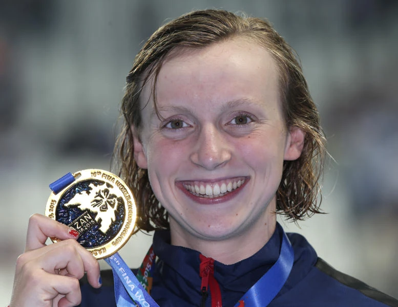 Ledecky romps to 5th gold with world-record swim