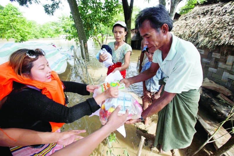 Myanmar govt, military win plaudits for flood response