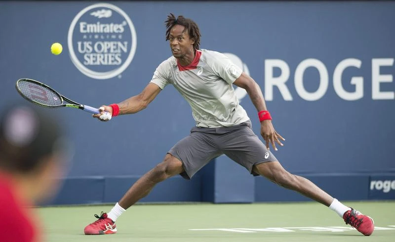 Frenchman Monfils, Simon move on in Montreal
