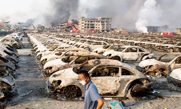Beijing defends initial response to chemical fires after port blasts