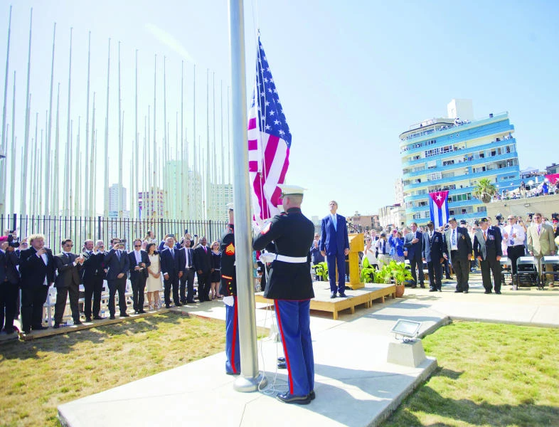Kerry calls for democracy as US flag raised in Cuba