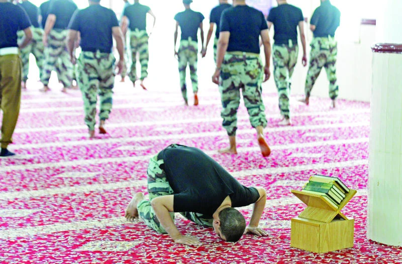Soldiers answer prayer calls in restored Asir mosque