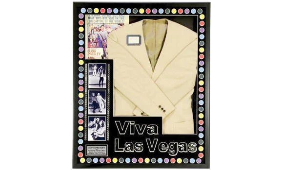Elvis’ jewelry, outfits fetch high bids