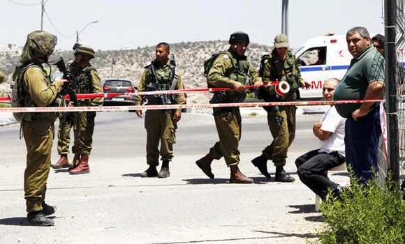 Palestinian slain after knife attack injures soldier lightly