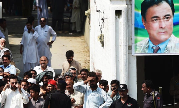 Minister’s killing in suicide attack stuns Pakistanis