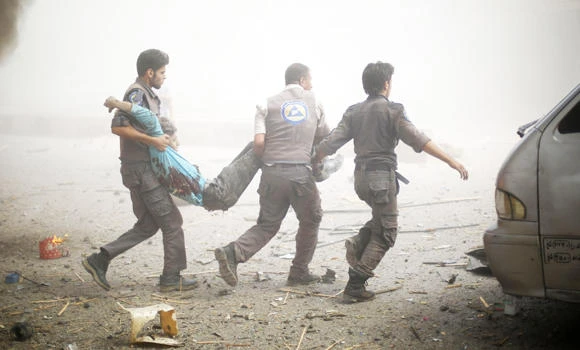 Over 80 Syrians dead as regime air raids hit town