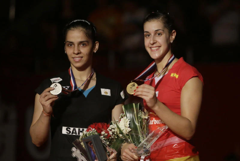 Chen, Marin extend reign at badminton worlds