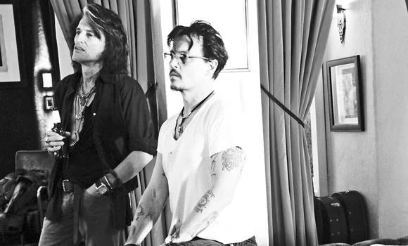 Depp, Simmons rock for kids’ charity