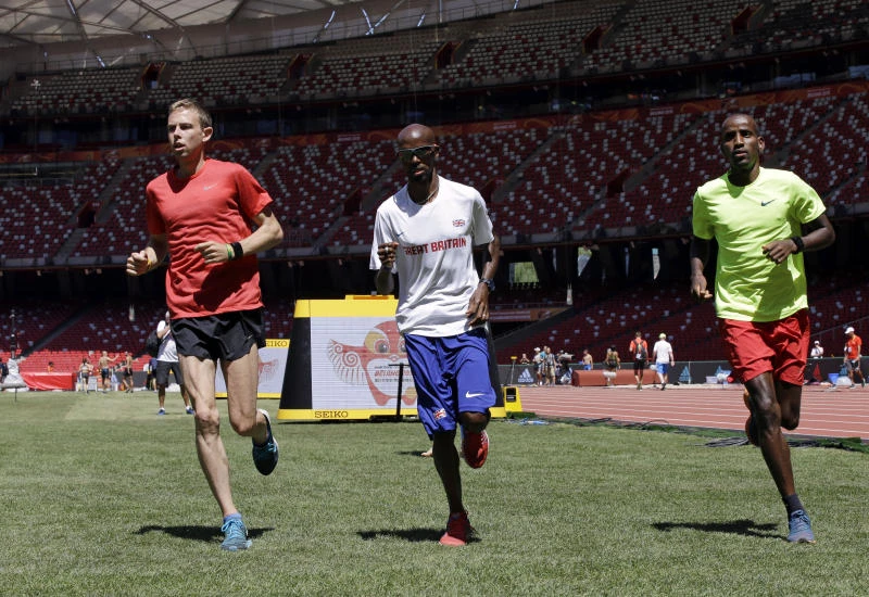 Bolt makes bow as Farah, Kiprotich eye history books