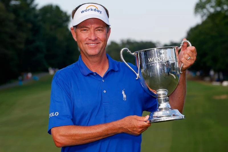Love defies Father Time to win Wyndham