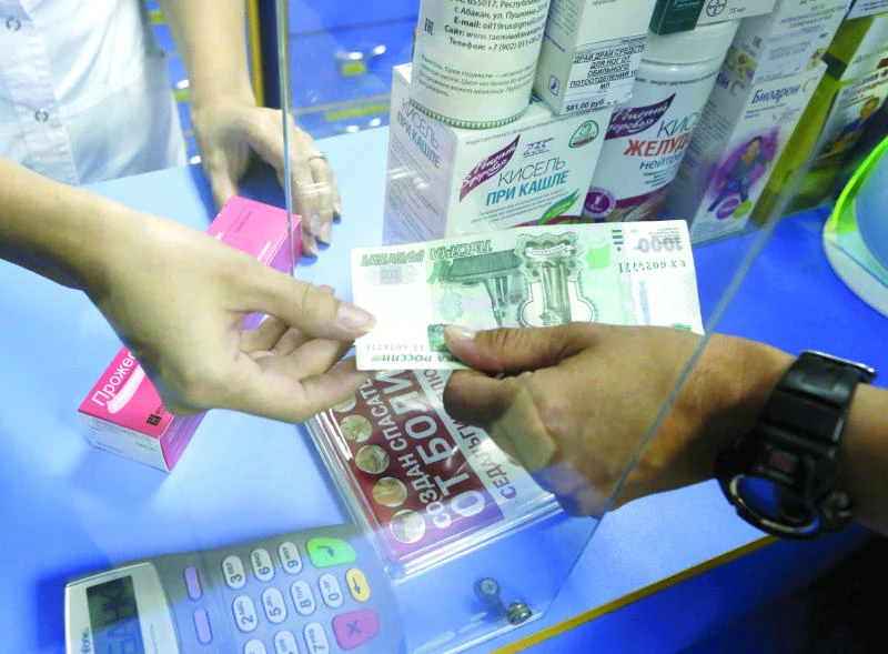 Russia’s central bank makes small rate cut as ruble weakens